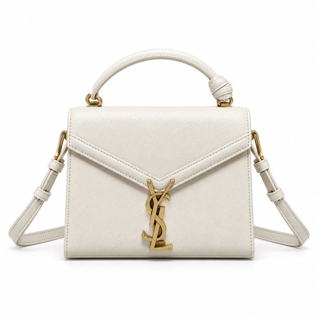 Saint Laurent Cassandra Mini cream smooth leather top handle bag with gold YSL monogram charm, braided knotted handle and adjustable crossbody strap